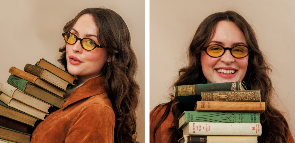 Black oval sunglasses with dark lenses and slim acetate frame, modern UK eyewear.