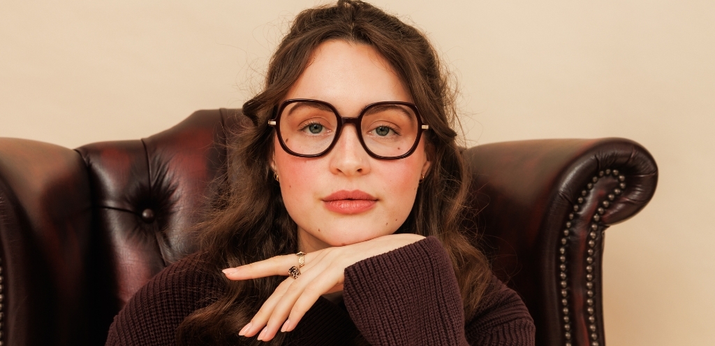 Plum coloured round acetate prescription glasses with bold full-rim design, UK optical frame.