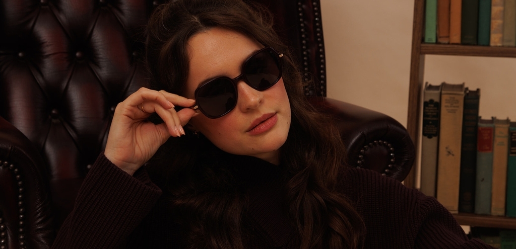 Plum oversized round acetate sunglasses with grey lenses, full-rim gold metal frame.