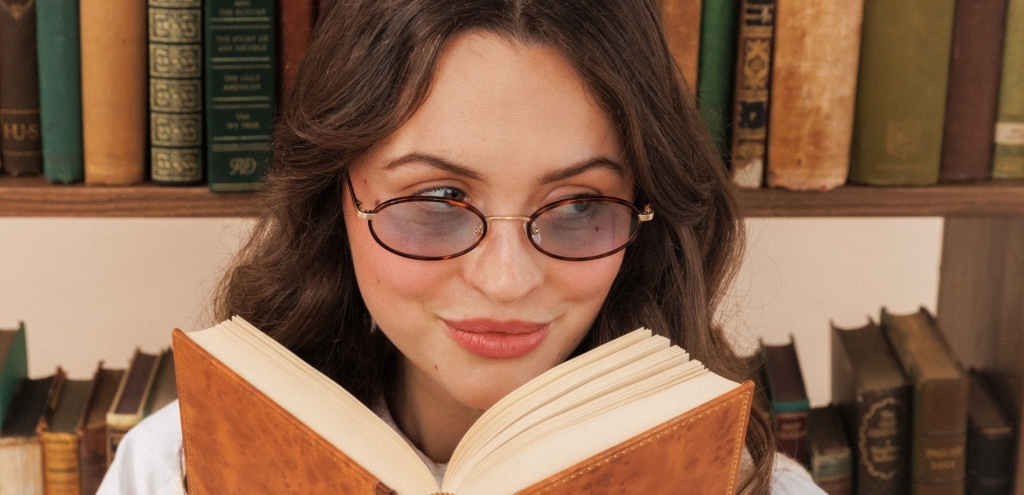 Havana & gold oval sunglasses with blue glacier tint lenses and slim metal frame.