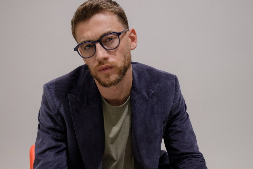 Male model showcasing IOLLA Boyd Stone Blue Glasses