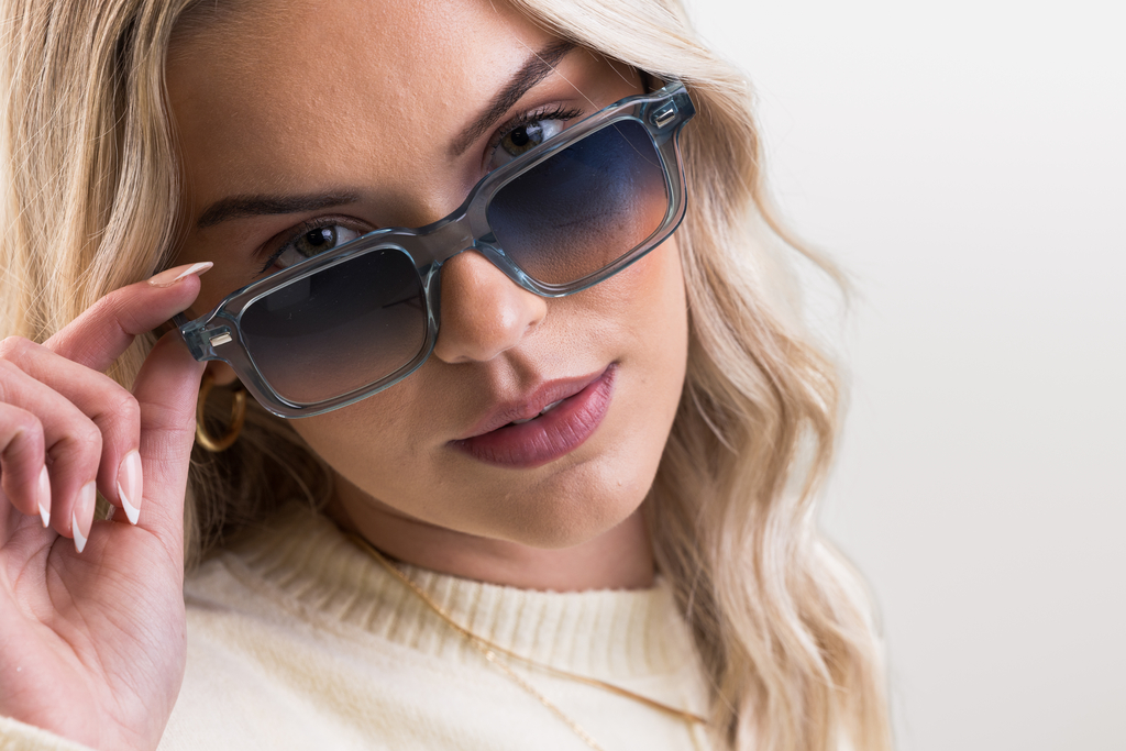 IOLLA Angus Sunglasses in Teal Crystal with Ocean Glow Shown on Female Model