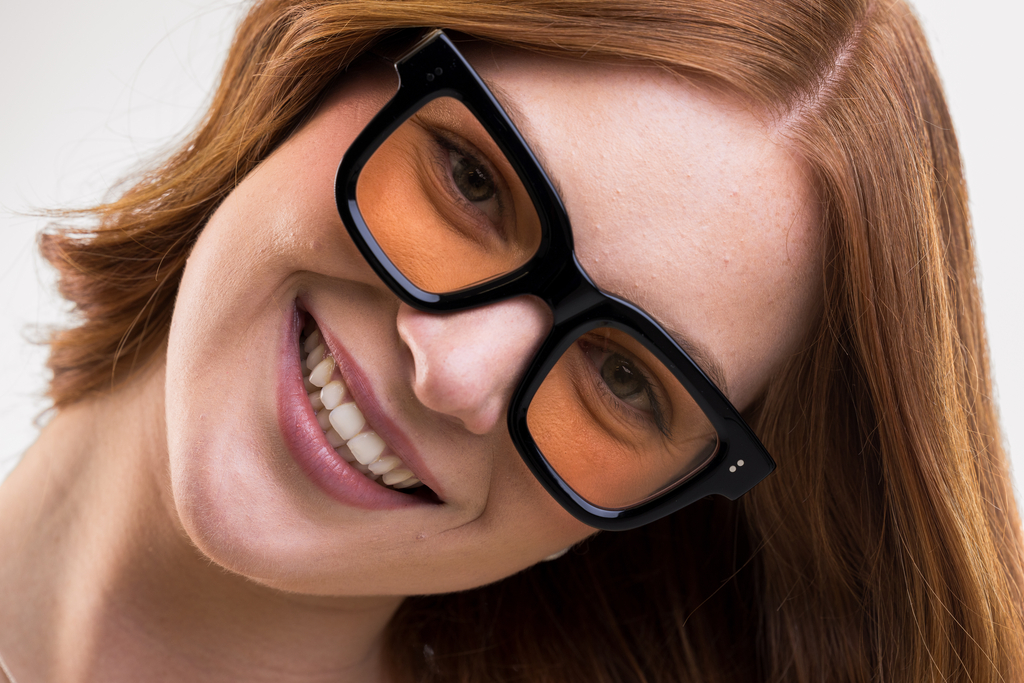 IOLLA Brodie Sunglasses in Black with Tangerine Shown on Female Model
