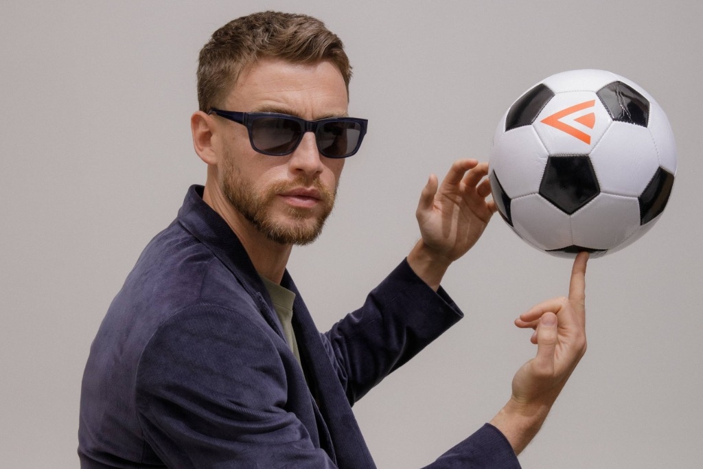 Male model showcasing IOLLA Maclean Stone Blue Sunglasses with Grey Lenses