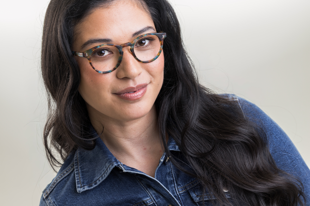 female model wearing Bell Matte Ocean Tortoise Glasses