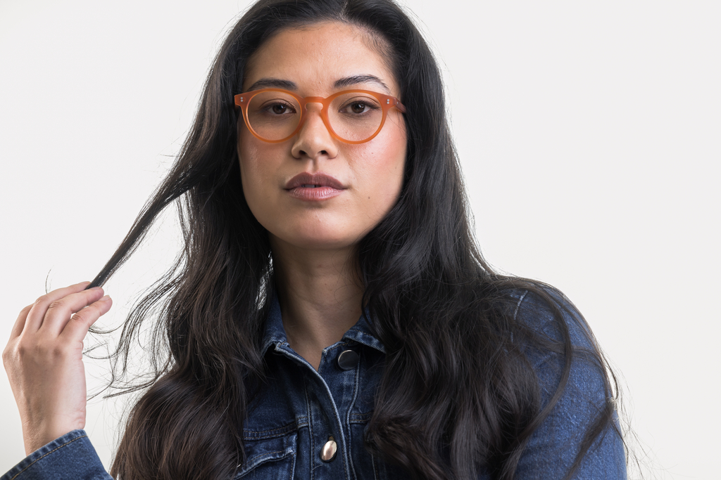 female model wearing Bell Orange Glasses