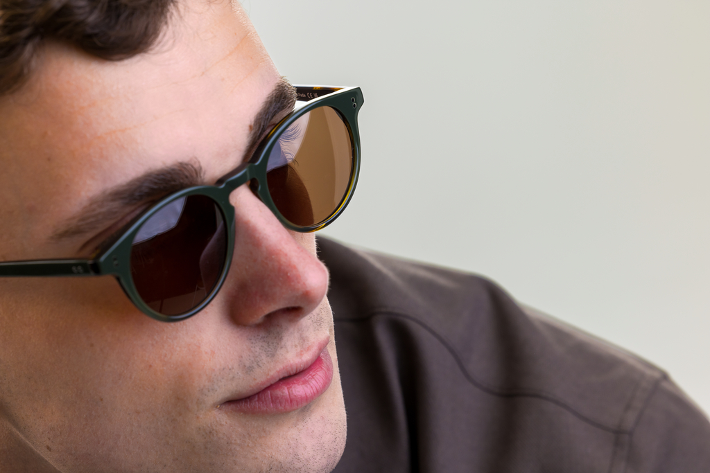 male model wearing Bell sunglasses in Woodland Fade with Brown Polarised Lenses