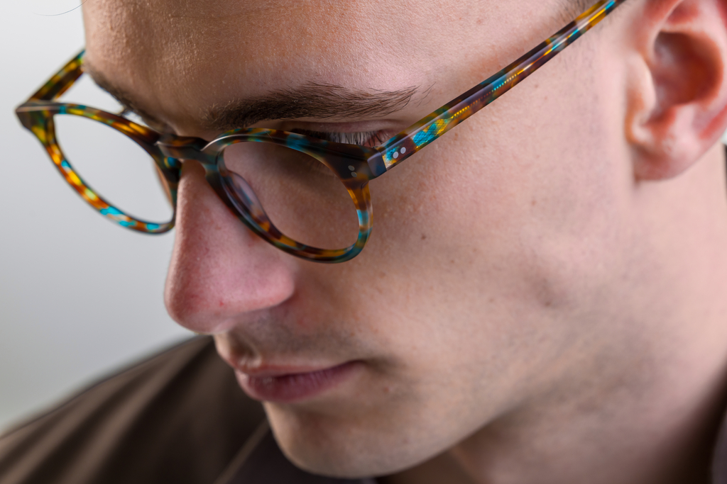 male model wearing Bell Matte Ocean Tortoise Glasses