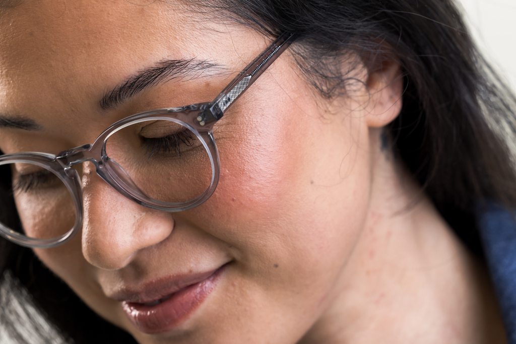 female model wearing Bell Light Grey Crystal Glasses