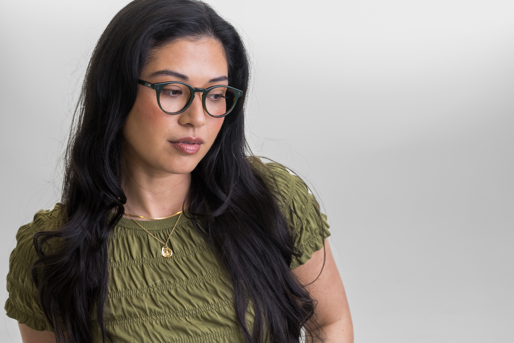 female model wearing Bell Woodland Fade glasses