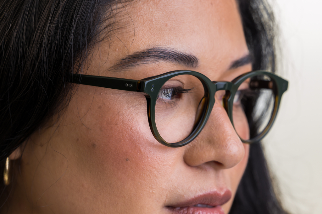 female model wearing Bell Woodland Fade glasses