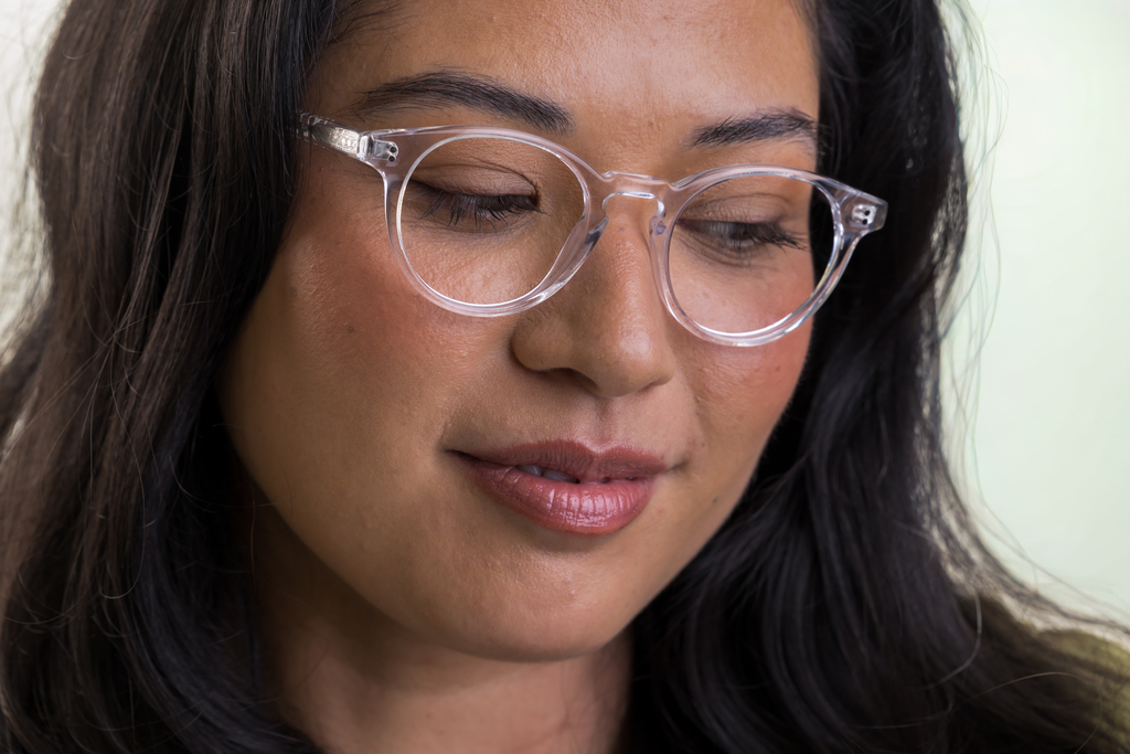 female model wearing Bell Clear Crystal Glasses