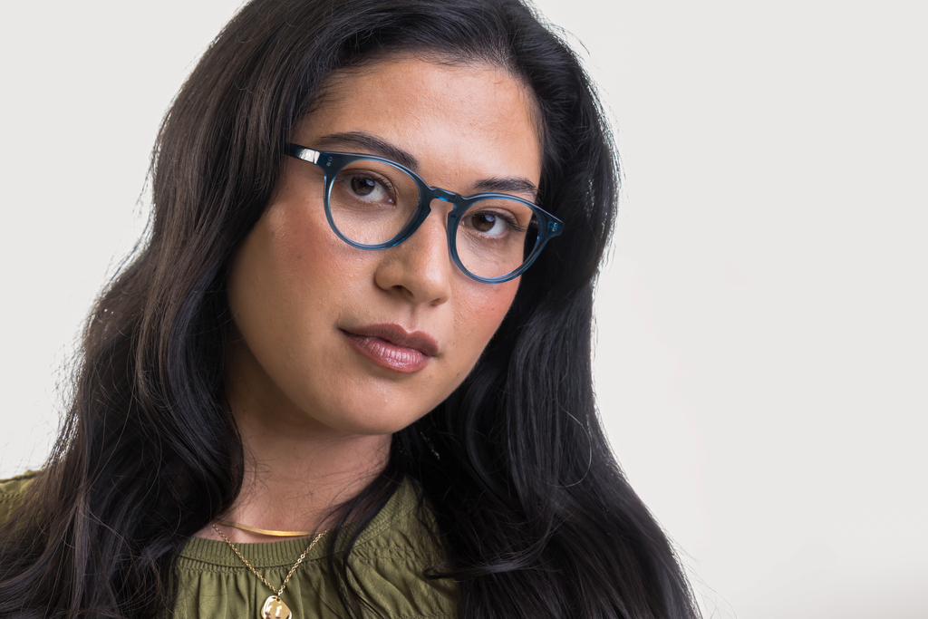female model wearing Bell Blue Azure glasses