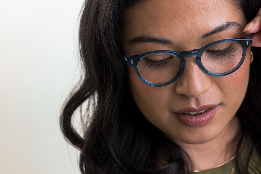 female model wearing Bell Blue Azure glasses