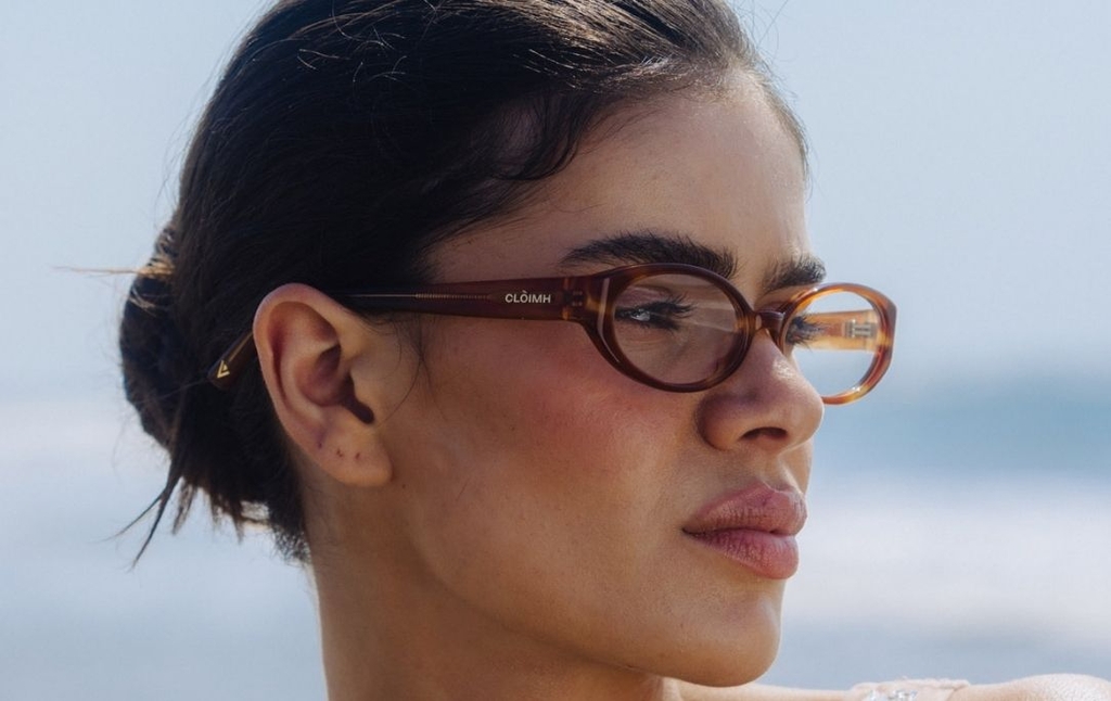 Model wearing 002 Cinnamon Swirl Glasses side view