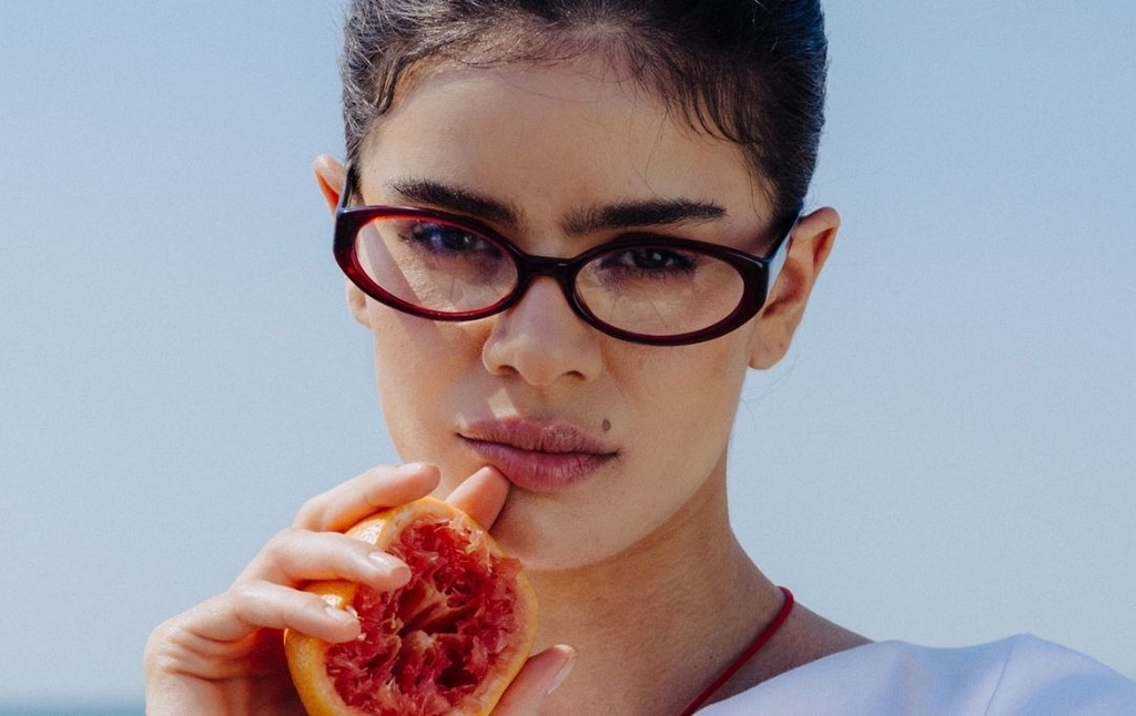 Model wearing 002 Merlot Glasses front view