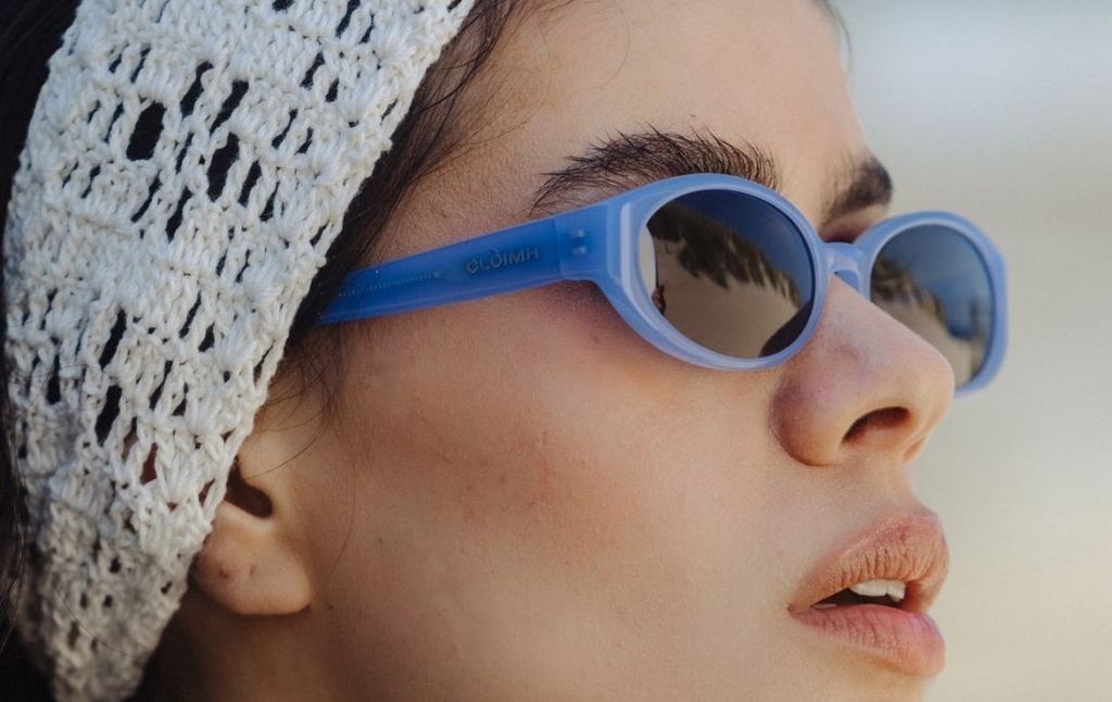 Model wearing Icy Blue Sunglasses with Grey Lenses side profile