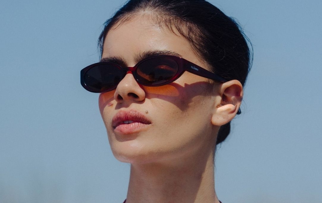 Model wearing 002 Merlot Sunglasses with Brown Lenses side profile