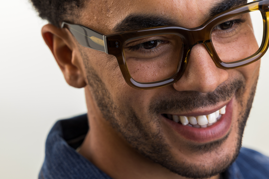 Male model wearing husk crystal side angle profile