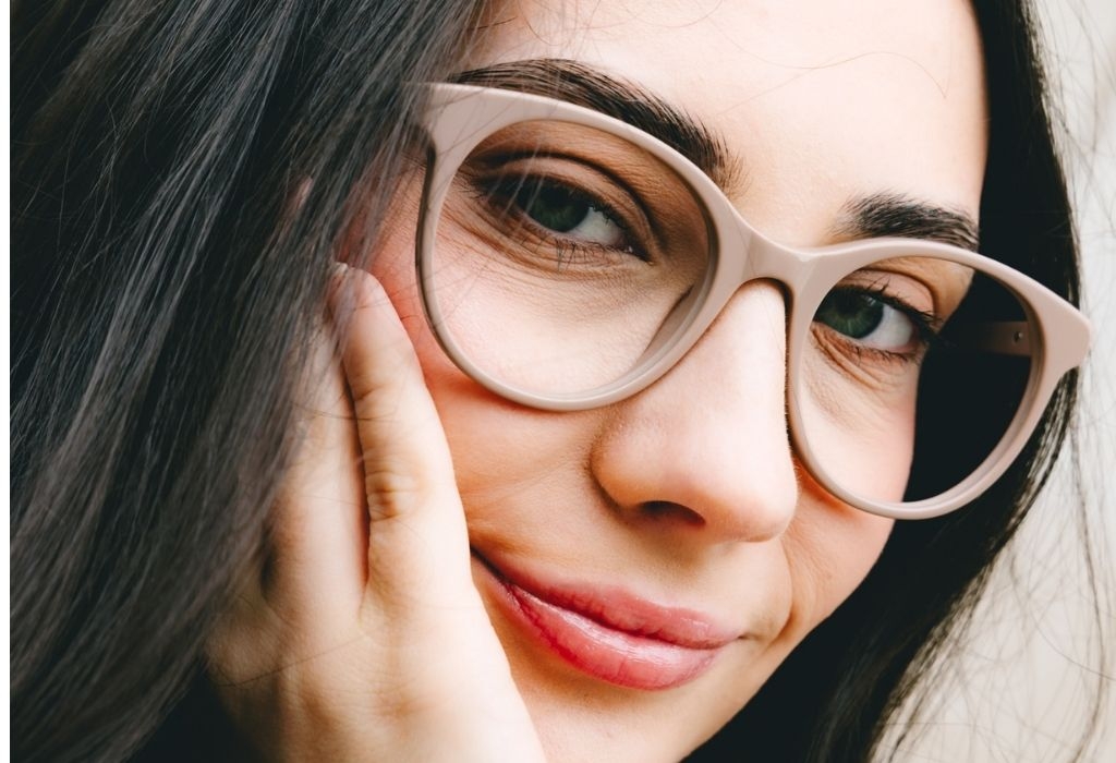 Female model wearing Crawford Mocha Glasses close-up