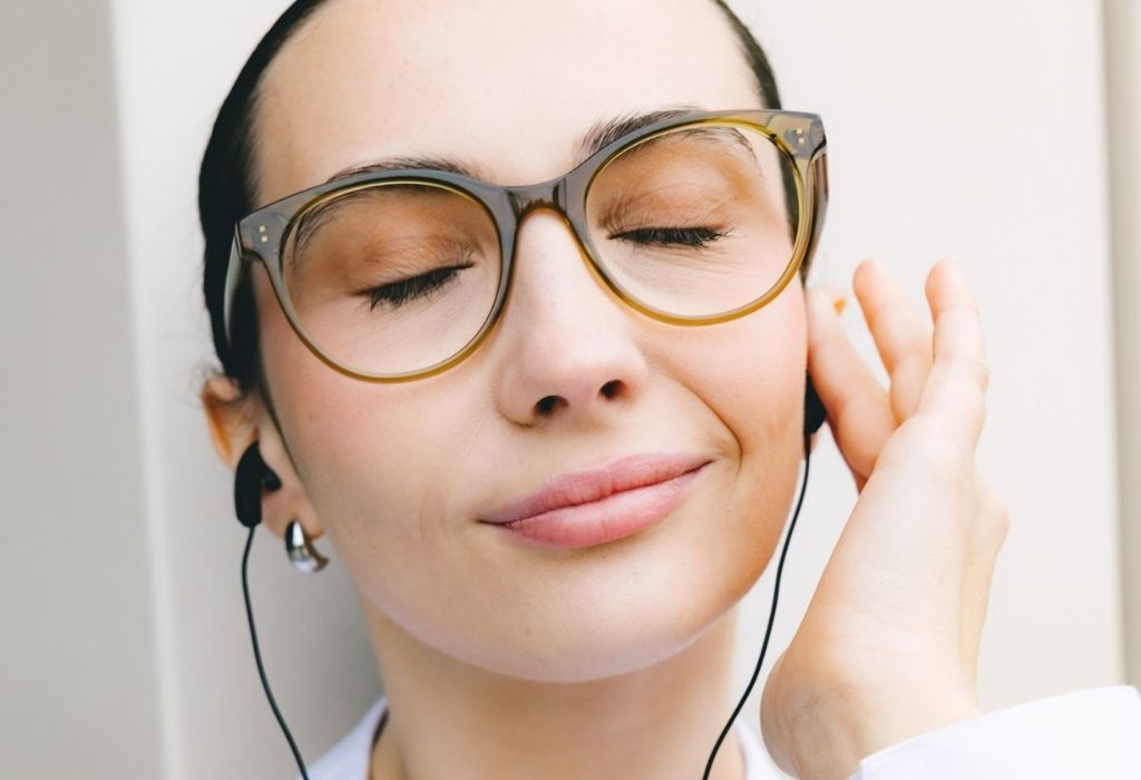 Female model wearing Crawford Husk Crystal Glasses close-up