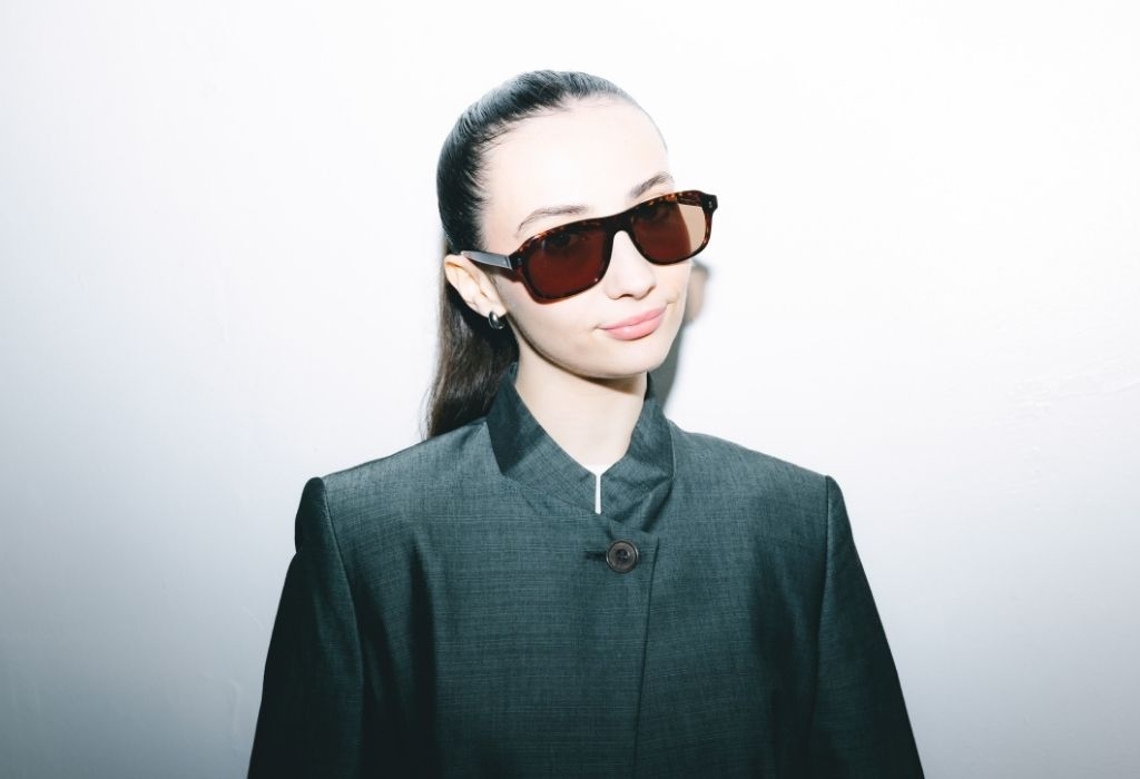 Female model wearing Lachlan Deep Havana sunglasses front profile