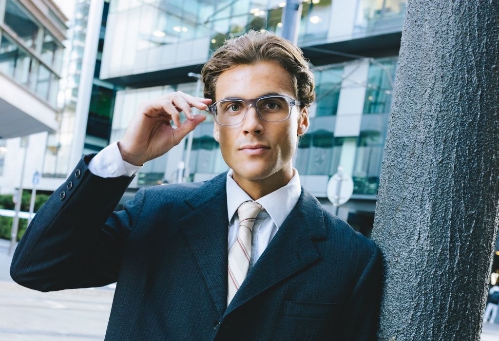 Male model wearing Lachlan Light Grey Crystal Glasses front profile