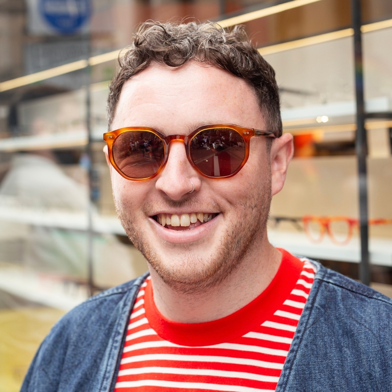 Paul Black wearing IOLLA Williams Sunglasses in Amber