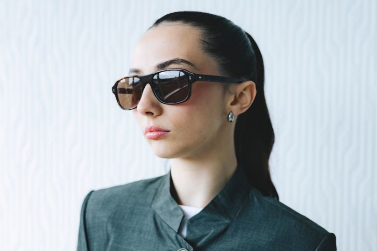 Female model wearing Lachlan Deep Havana sunglasses