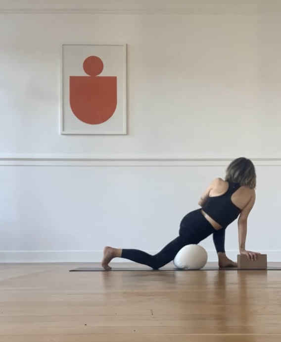 Woman doing yoga in studio