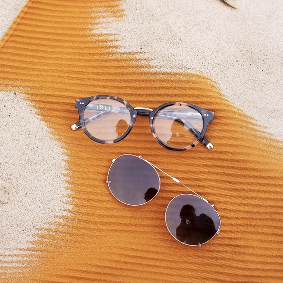 murray folding clip ons at the beach on an orange towel