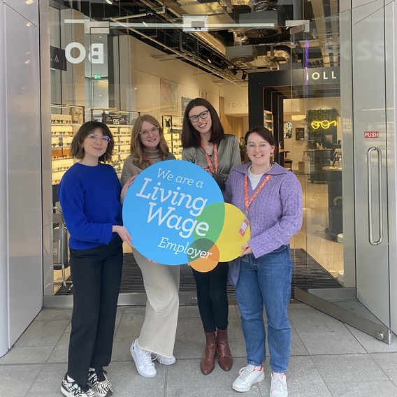 IOLLA Edinburgh real living wage employer sign