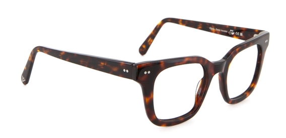 Dark tortoiseshell IOLLA glasses sideways facing on white background