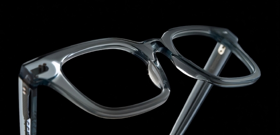 IOLLA Clyde glasses front facing angled up on a black background