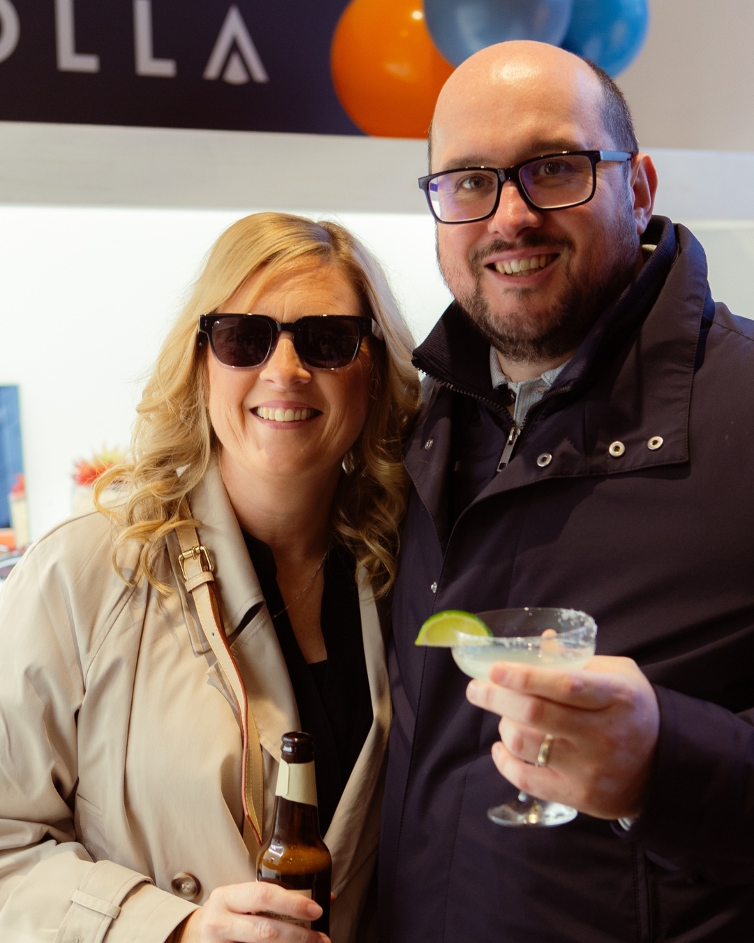 IOLLA customers wearing IOLLA glasses and holding drink