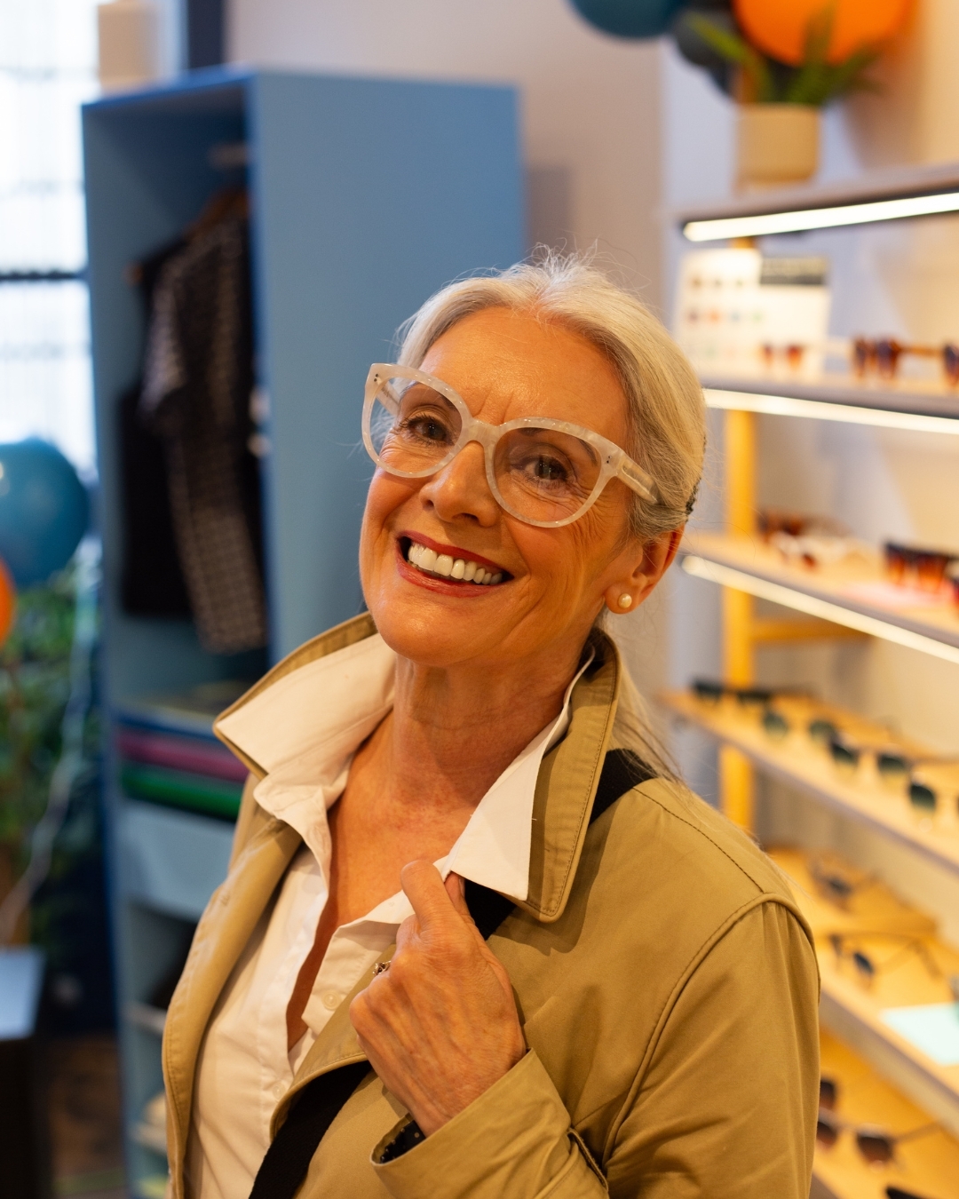 IOLLA customer in showroom wearing glasses