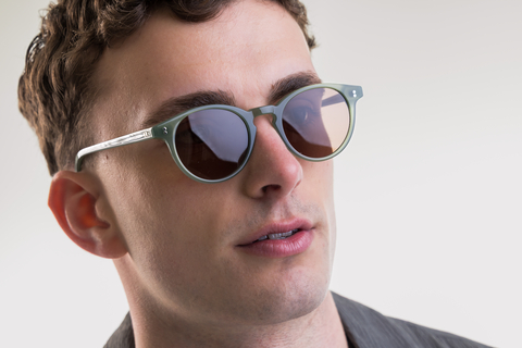 male model wearing Bell sunglasses in Khaki Green with Brown Lenses