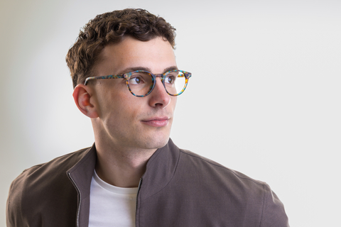 male model wearing Bell Matte Ocean Tortoise Glasses