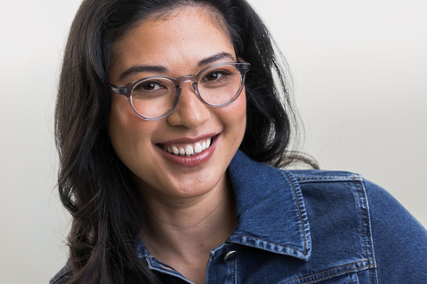 female model wearing Bell Light Grey Crystal Glasses