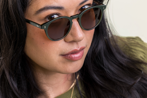 female model wearing Bell sunglasses in Woodland Fade with Brown Polarised Lenses