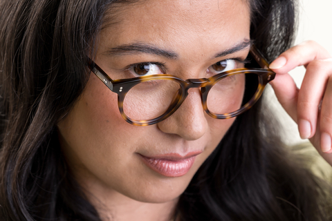 female model wearing Bell Light Medium Havana Glasses