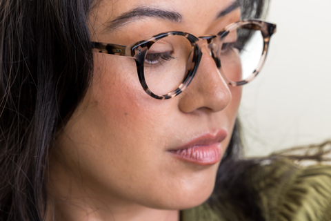 female model wearing Bell Vanilla Tortoise Glasses