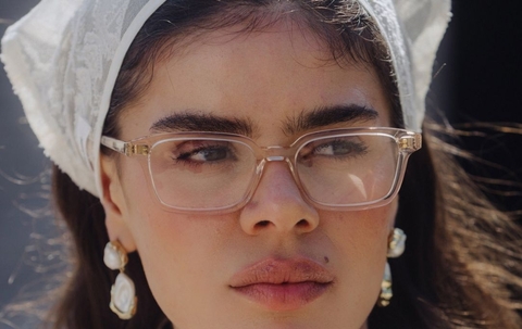 Model wearing 001 Vanilla Crystal Glasses