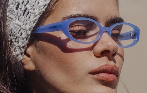 Model wearing 002 Icy Blue Glasses side view