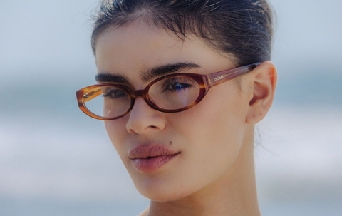 Model wearing 002 Cinnamon Swirl Glasses front view