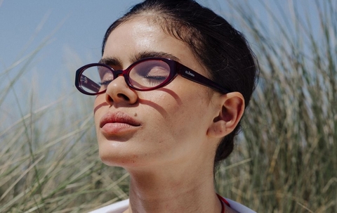 Model wearing 002 Merlot Glasses side view