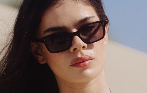 Model wearing 001 Black Sunglasses with Grey Lenses front profile