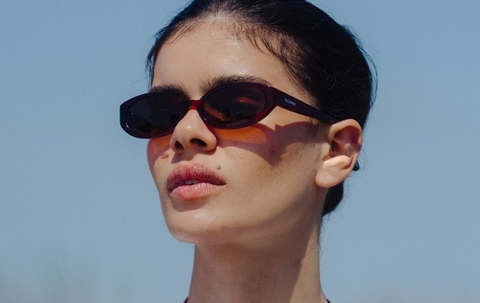 Model wearing 002 Merlot Sunglasses with Brown Lenses side profile