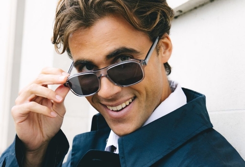 Male model wearing Lachlan Light Grey Crystal Sunglasses smiling